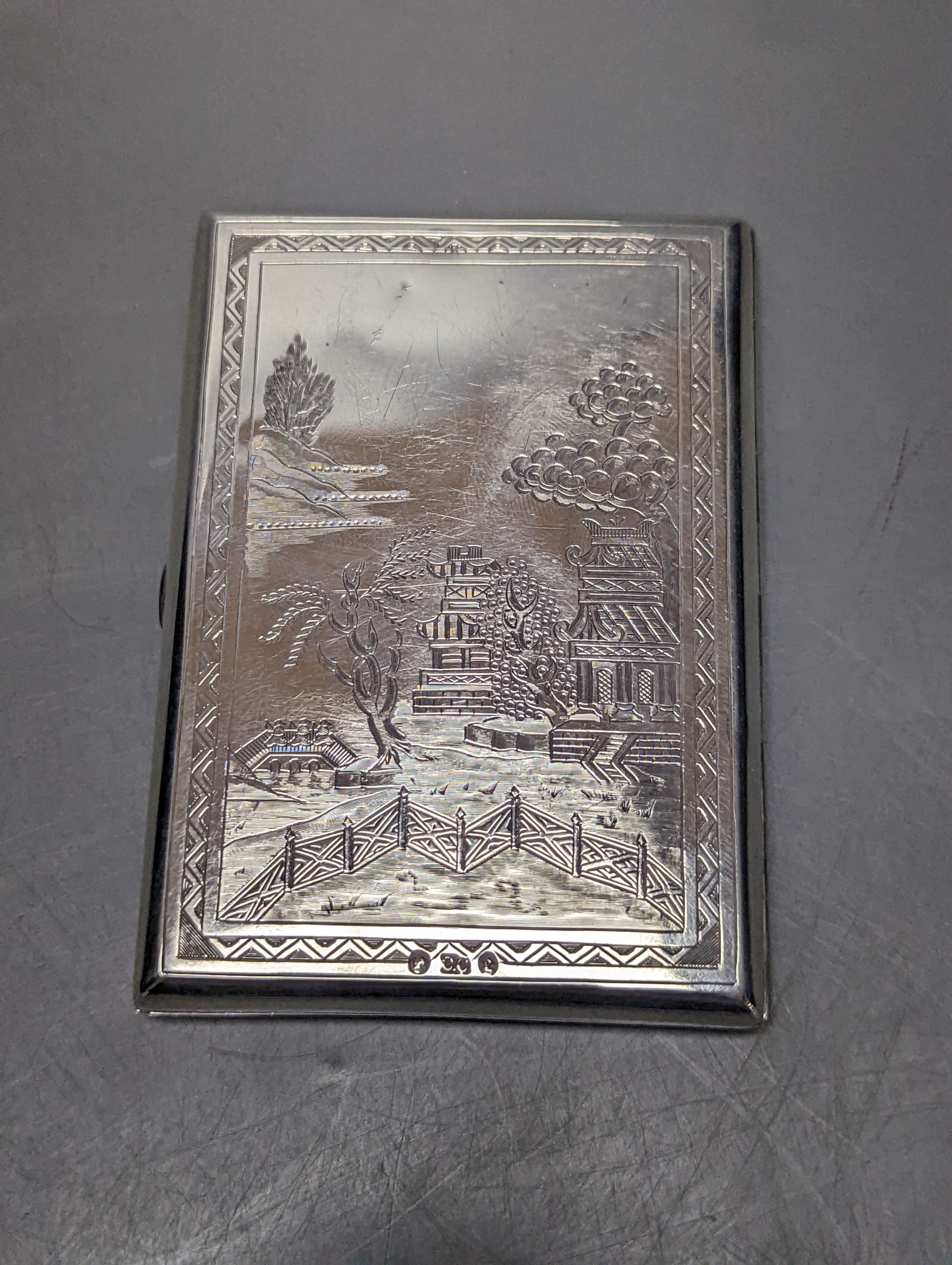 A Victorian silver card purse, with engraved chinoiserie decoration, Colen Hewer Cheshire, Birmingham, 1879, 10.1cm.